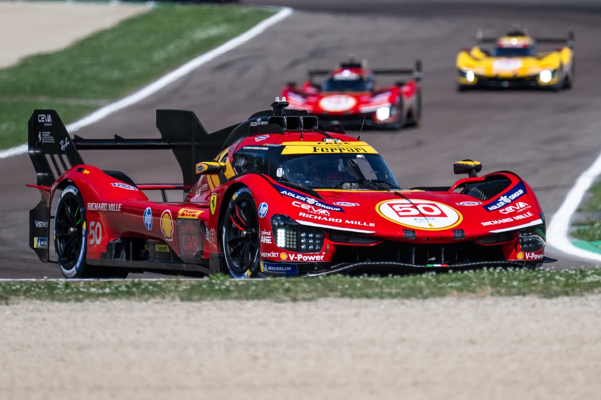 Ferrari 499P #50 leads a train of hypercars during a WEC round. Credit: FIA WEC