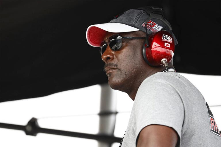 Michael Jordan looking thoughtful in the pits